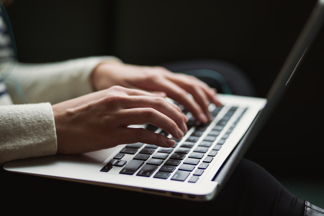 person-using-laptop-vzjdyl5jvxy
